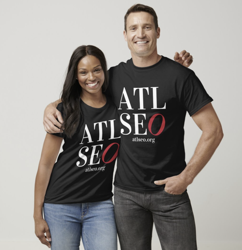 Two ATL SEO community members wearing the official black ATL SEO t-shirt